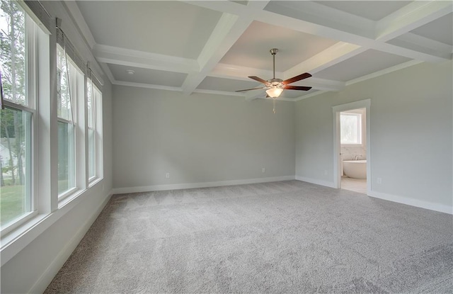 carpeted empty room featuring beam ceiling, ceiling fan, and coffered ceiling