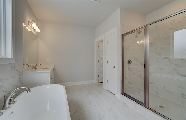 bathroom featuring vanity and separate shower and tub