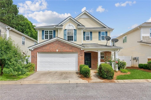 3698 Roseman Lndg, Cumming, GA 30040 - view of front of house with concrete driveway, brick siding, and a porch