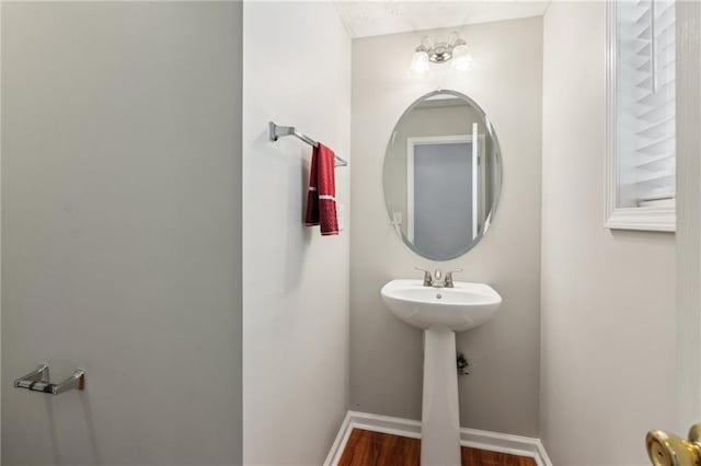 3698 Roseman Lndg, Cumming, GA 30040 - half bathroom featuring wood finished floors and baseboards