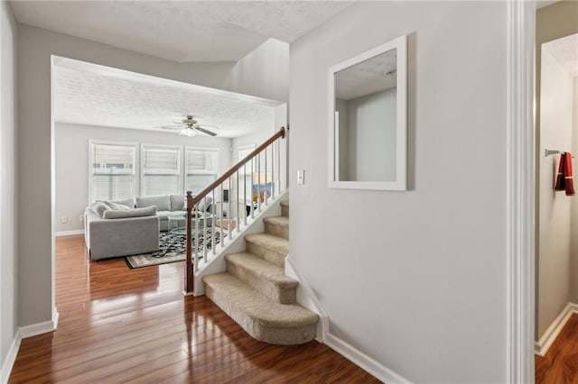 3698 Roseman Lndg, Cumming, GA 30040 - stairway featuring wood finished floors, baseboards, and ceiling fan
