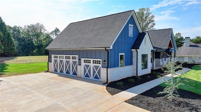 garage with a lawn