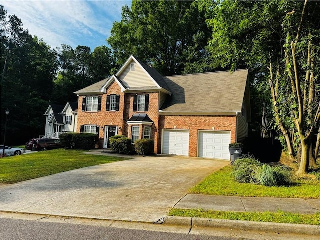 108 Northcutt Station Pl, Acworth, GA 30101 - traditional-style home featuring a garage, brick siding, driveway, and a front yard