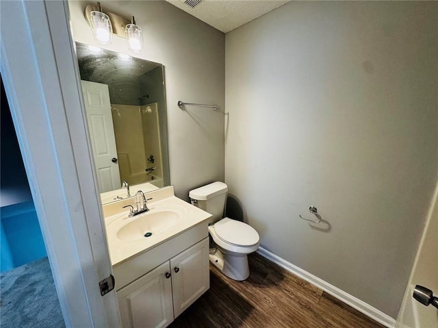 108 Northcutt Station Pl, Acworth, GA 30101 - full bath featuring vanity, toilet, wood finished floors, shower / tub combination, and baseboards