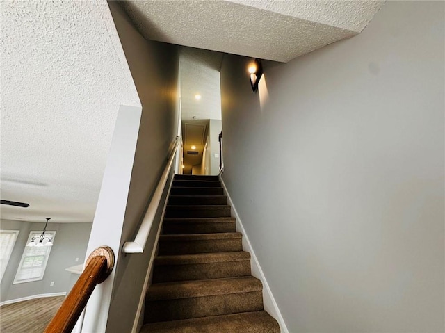 108 Northcutt Station Pl, Acworth, GA 30101 - stairway with a textured ceiling and baseboards