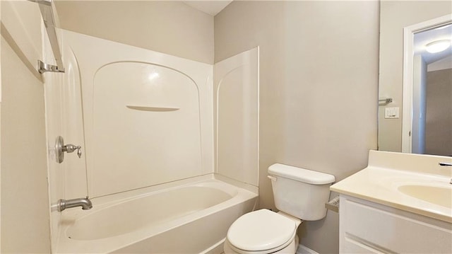 full bathroom with vanity, shower / bathing tub combination, baseboards, and toilet