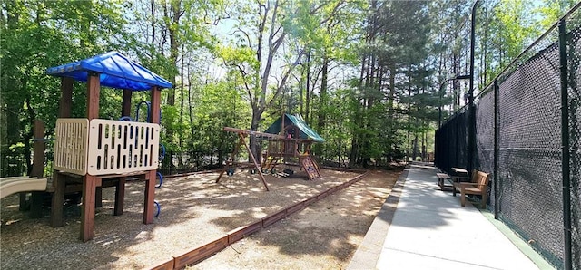 community play area featuring fence