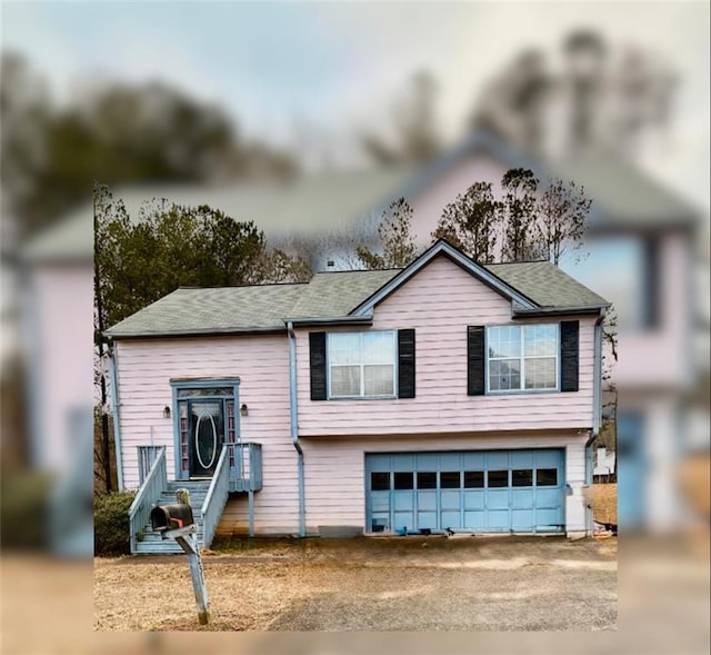 raised ranch with a garage