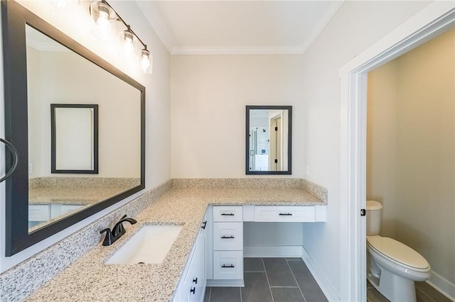 bathroom featuring baseboards, toilet, tile patterned floors, crown molding, and vanity