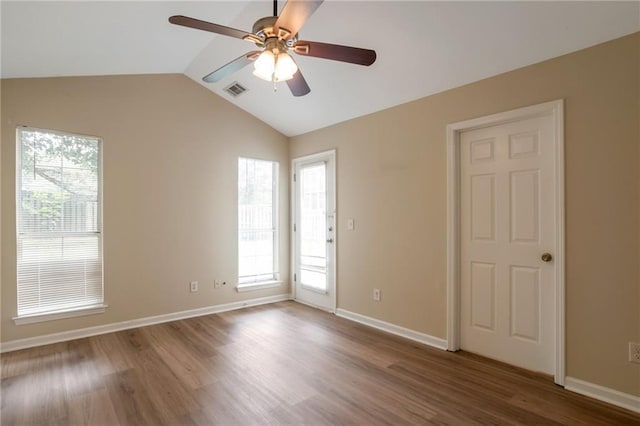 3984 Oak Glenn Dr, Duluth, GA 30096 - unfurnished room featuring a ceiling fan, wood finished floors, vaulted ceiling, and baseboards