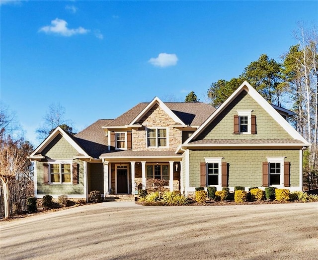 craftsman-style house featuring covered porch