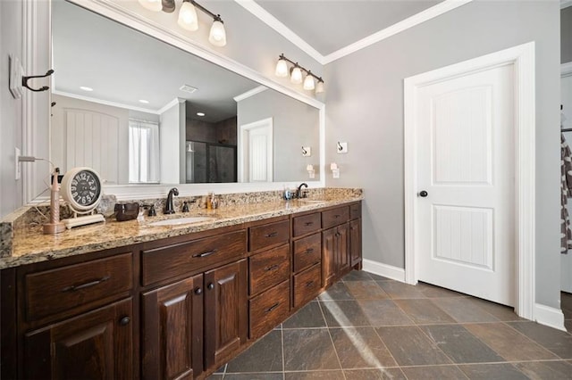 bathroom with vanity, walk in shower, and crown molding