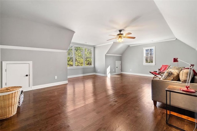 bonus room featuring lofted ceiling, dark hardwood / wood-style flooring, and ceiling fan