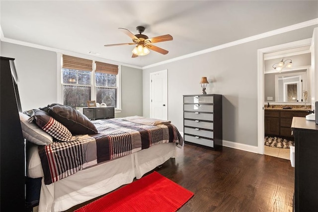 bedroom with ceiling fan, dark wood-type flooring, ornamental molding, and ensuite bath