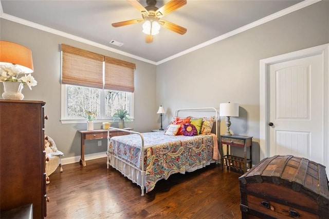 bedroom featuring ceiling fan, ornamental molding, and dark hardwood / wood-style floors