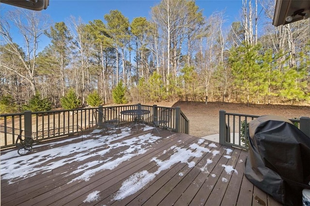 wooden deck with grilling area