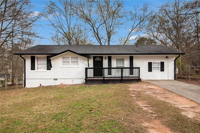 ranch-style home with crawl space, brick siding, a front yard, and fence