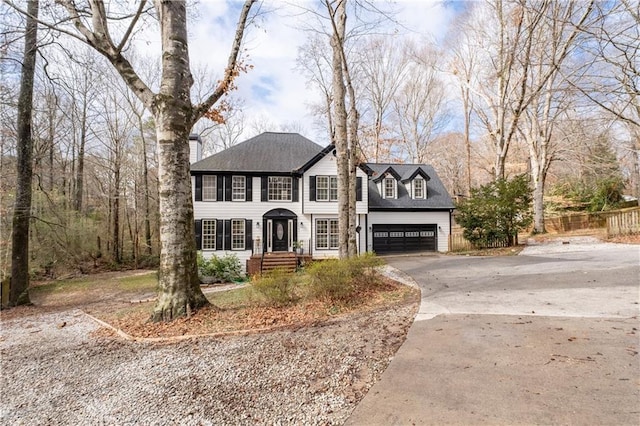 view of front of house with driveway and a garage