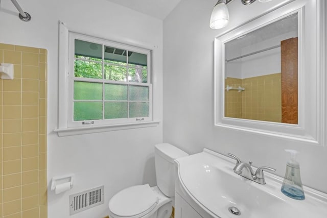 4856 Rock Haven Dr, Lilburn, GA 30047 - bathroom featuring a shower, toilet, and vanity