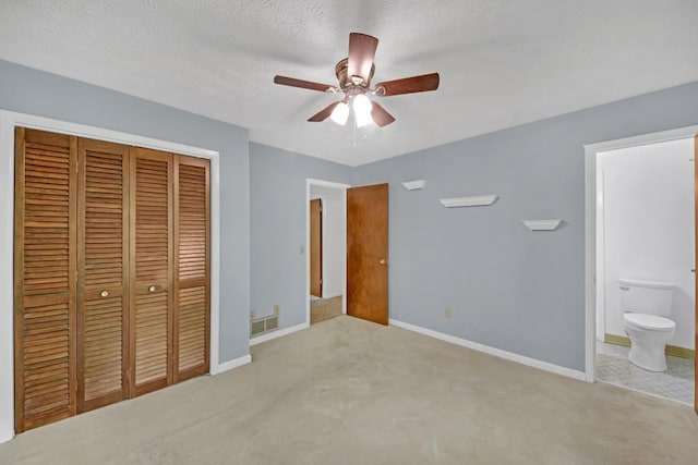 4856 Rock Haven Dr, Lilburn, GA 30047 - unfurnished bedroom with a closet, carpet flooring, baseboards, and connected bathroom