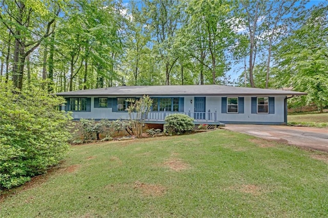4856 Rock Haven Dr, Lilburn, GA 30047 - single story home featuring concrete driveway and a front yard