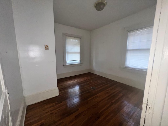 1165 Oak St SW, Atlanta, GA 30310 - empty room with hardwood / wood-style floors, plenty of natural light, and baseboards