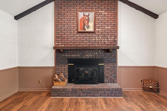 interior details with beam ceiling and wood-type flooring