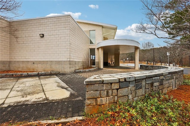 back of property featuring a patio