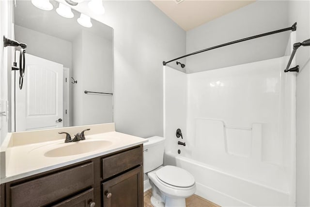 full bathroom with vanity, tile patterned flooring, bathtub / shower combination, and toilet