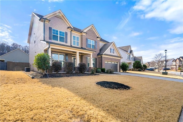 craftsman-style house with central air condition unit