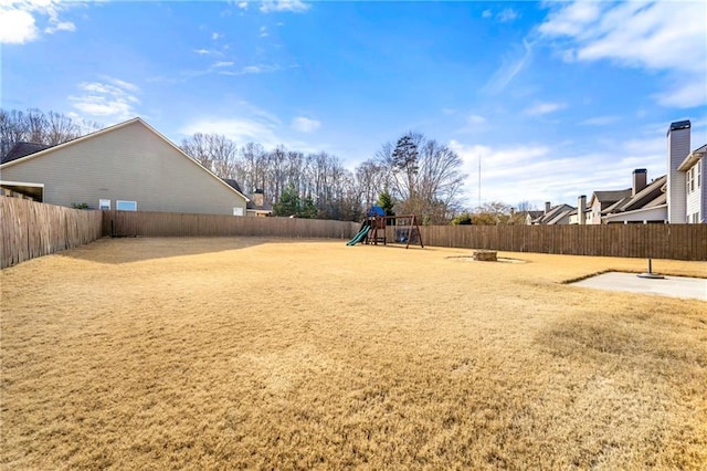 view of yard with a playground