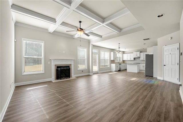 unfurnished living room with coffered ceiling, a premium fireplace, dark hardwood / wood-style floors, and ceiling fan