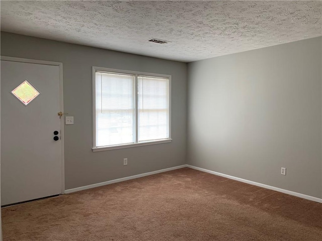 499 Oak Way, Lawrenceville, GA 30046 - carpeted spare room featuring a textured ceiling and baseboards
