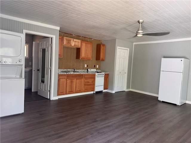 499 Oak Way, Lawrenceville, GA 30046 - kitchen featuring white appliances, stacked washer / dryer, ceiling fan, dark wood-style floors, and brown cabinets