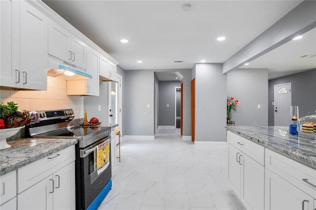 10664 Sandpiper Rd, Jonesboro, GA 30238 - kitchen with electric range, under cabinet range hood, light marble finish flooring, baseboards, and recessed lighting