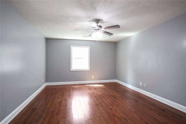 10664 Sandpiper Rd, Jonesboro, GA 30238 - unfurnished room with a ceiling fan, wood finished floors, a textured ceiling, and baseboards