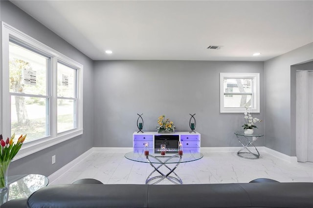 10664 Sandpiper Rd, Jonesboro, GA 30238 - office space featuring light marble finish floors, plenty of natural light, baseboards, and recessed lighting