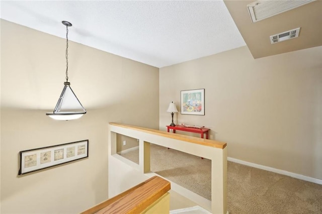 145 15th St NE Unit 204, Atlanta, GA 30309 - interior space featuring a textured ceiling, visible vents, and baseboards