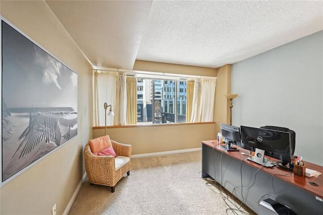 145 15th St NE Unit 204, Atlanta, GA 30309 - home office featuring carpet flooring, baseboards, and a textured ceiling
