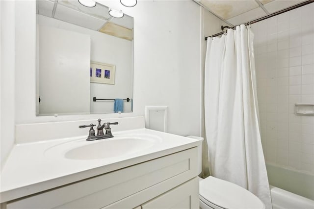 145 15th St NE Unit 204, Atlanta, GA 30309 - bathroom featuring toilet, shower / tub combo with curtain, and vanity