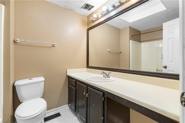 1822 Oriole Trl, Lithia Springs, GA 30122 - full bath featuring toilet, vanity, a textured ceiling, and baseboards
