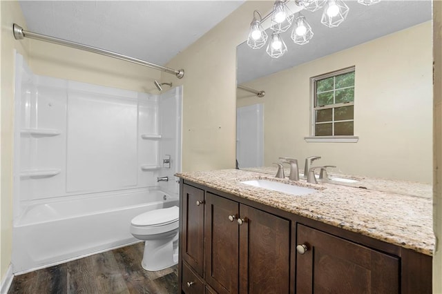 1822 Oriole Trl, Lithia Springs, GA 30122 - full bath featuring wood finished floors, vanity,  shower combination, and toilet