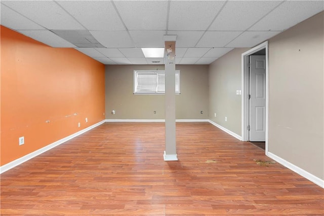 1822 Oriole Trl, Lithia Springs, GA 30122 - below grade area featuring light wood finished floors, baseboards, and a drop ceiling