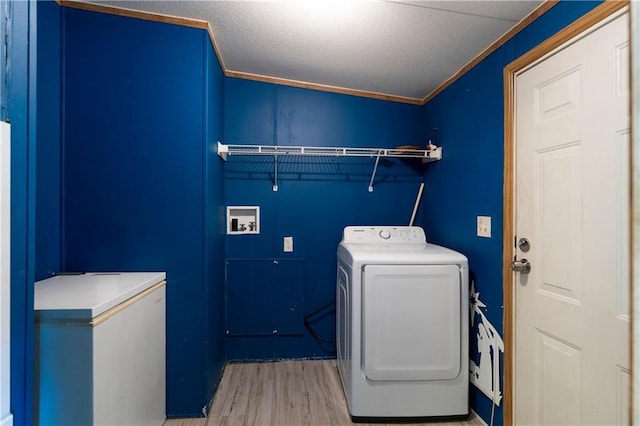 518 W Nance Springs Rd, Resaca, GA 30735 - laundry room with washer / dryer, light wood-type flooring, and crown molding