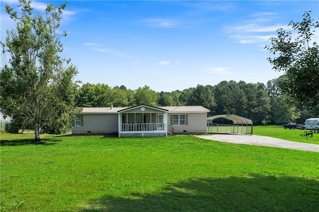 518 W Nance Springs Rd, Resaca, GA 30735 - manufactured / mobile home featuring concrete driveway, a detached carport, a front lawn, and crawl space