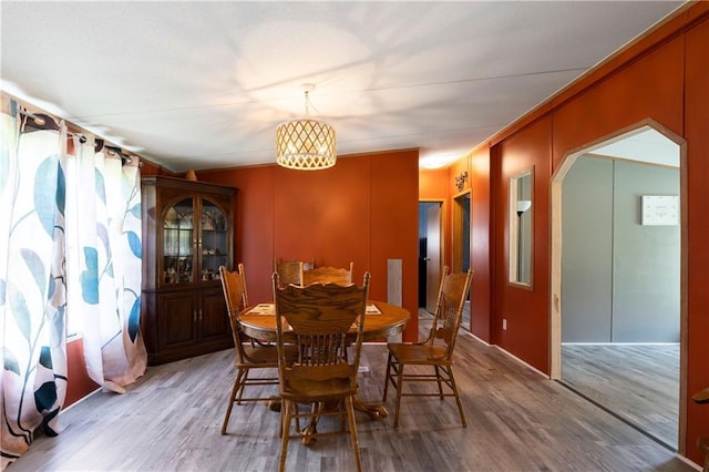 518 W Nance Springs Rd, Resaca, GA 30735 - dining room featuring wood finished floors, crown molding, and arched walkways