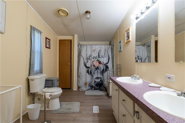 518 W Nance Springs Rd, Resaca, GA 30735 - full bath featuring wood finished floors, double vanity, a shower with curtain, and ornamental molding