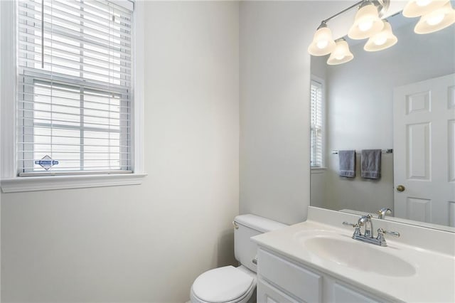 4321 Sugar Maple Chase NW, Acworth, GA 30101 - half bath with toilet, vanity, and a chandelier
