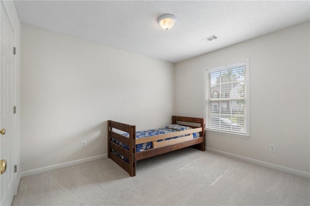 4321 Sugar Maple Chase NW, Acworth, GA 30101 - bedroom featuring carpet flooring, a textured ceiling, and baseboards