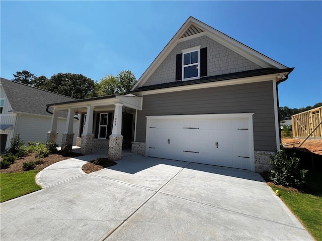 craftsman inspired home with a garage